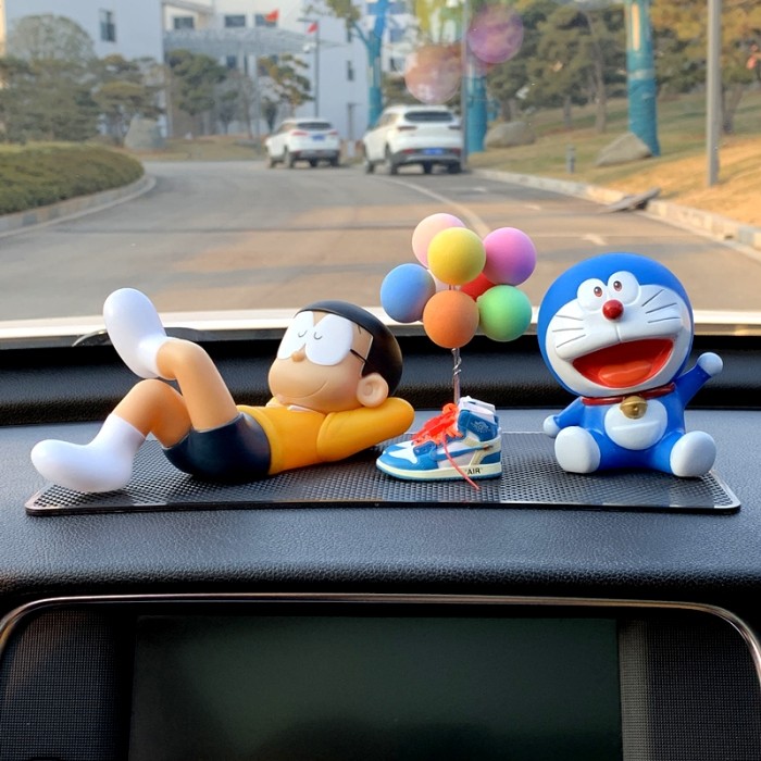 6 Pilihan Hiasan Dashboard Mobil yang Unik dan Keren