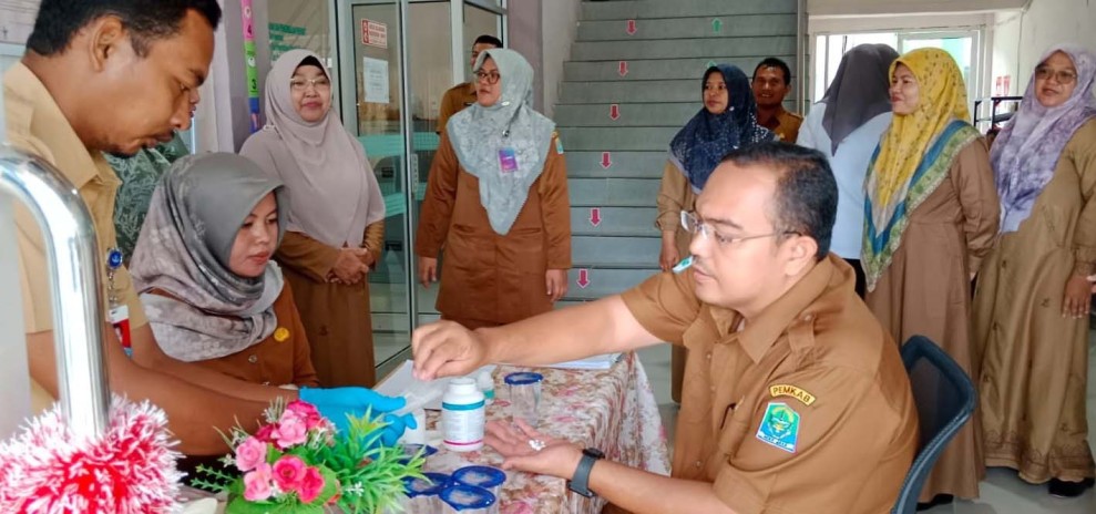 Tajuk: Upaya Pemerintah dan Kementerian Kesehatan Perangi Filariasis di Mimika: Targetkan 3.000 Sampel Kaki Gajah