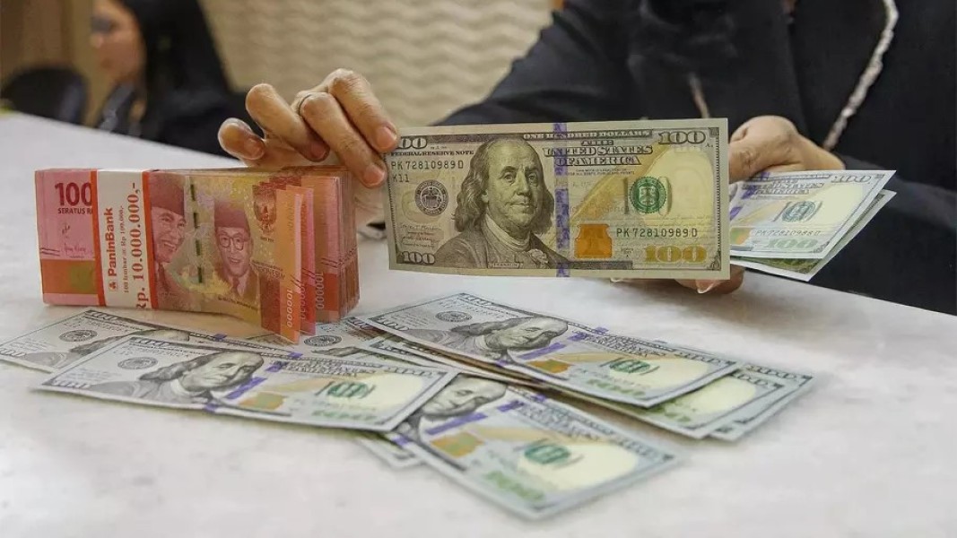 Fluktuasi Rupiah dan Dolar AS Hari Ini, Investor Waspadai Sinyal Suku Bunga