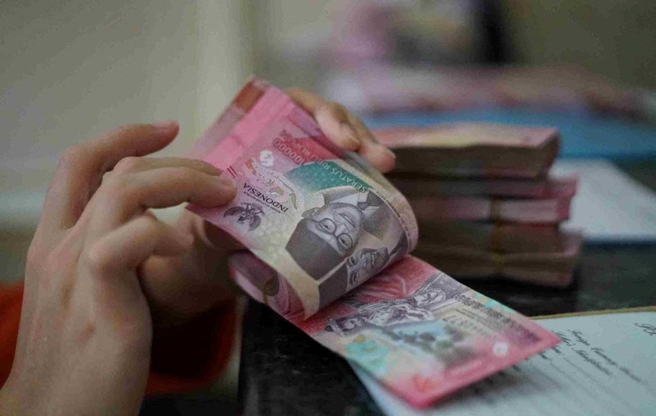 Rupiah Bertahan Meski Tertekan, Pasar Tunggu Keputusan Federal Reserve