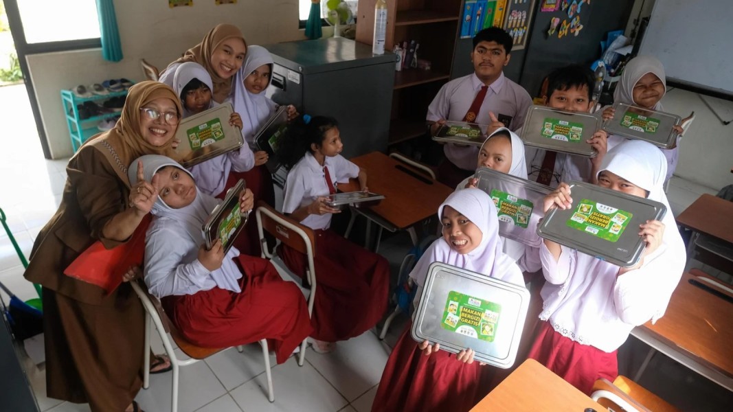 Grab dan OVO Tawarkan Makan Bergizi Gratis di 40 Sekolah Tangerang