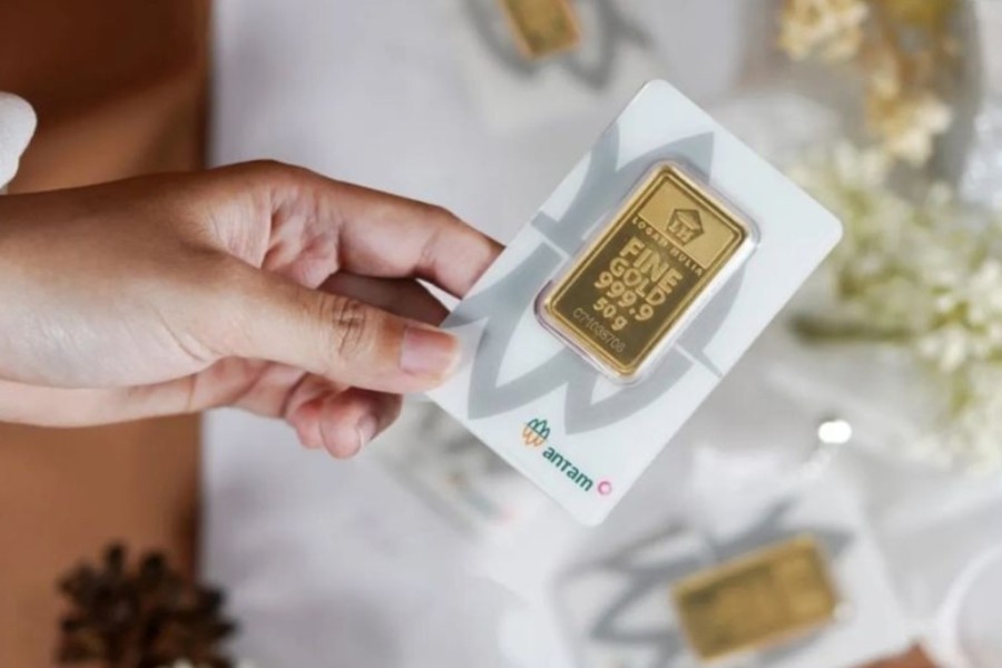 Harga Emas Anjlok Akibat Penguatan Dolar dan Suku Bunga
