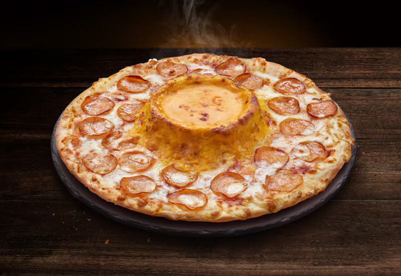 Dominos Pizza: Lelehan Keju dan Daging Menggoda