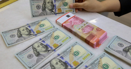 Rupiah Menguat Tipis Dolar AS Bertahan di Level Tinggi Pasar Global